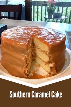 there is a cake that has been cut in half on a plate with the words southern caramel cake