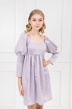 Ethereal babydoll dress with puffed sleeves and sweetheart neckline. This romantic dress features delicately smocked upper bodice and full skirt. The mauve satin shines in the light, making it a garment straight out of a dream. Inches (in) Size Bust Waist Hip XS 31" 23" 33" S 33" 25" 35" M 35" 27" 37" L 37" 29" 39" XL 39" 31" 41" Centimeters (cm) Size Bust Waist Hip XS 78 cm 58 cm 83 cm S 83 cm 63 cm 88 cm M 88 cm 68 cm 93 cm L 93 cm 73 cm 99 cm XL 99 cm 78 cm 104 cm