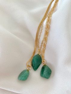 **Each piece in my shop, I personally create and photograph. (All photos are property of The Cord Gallery LLC) Thank you for supporting my small business. All Natural Aventurine Pendant Necklace Add a pop of  green to your accessories with these pretty pendant necklaces! Features genuine Aventurine Gemstones, tumbled to a smooth, asymmetrical size and finish. Adorned on your choice of chain in the length of your choosing.  Chain Options: Gold Filled Link Chain Gold Filled Box Chain Gold Filled F Aventurine Natural Stone Dangle Jewelry, Aventurine Gemstone Bead Pendant Jewelry, Adjustable Aventurine Dangle Jewelry, Emerald Necklace With Natural Aventurine Stones As Gift, Aventurine Stones For Jewelry Making, Aventurine Jewelry With Natural Stones For May Birthstone, Aventurine Gemstone Necklace For May Birthstone, Aventurine Natural Stones Jewelry For May Birthstone, Everyday Aventurine Jewelry With Natural Stones