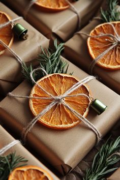 orange slices wrapped in brown paper and tied with twine on top of each other