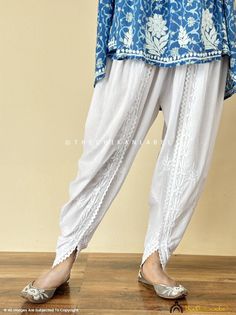 ▪ Fabric: Mulmul Cotton ▪ Occasions: Casual Wear, Office Wear, Festive Wear ▪ Garment Care: Hand Wash Only ▪ Waistband: Elasticated ▪ Length: 38-39 Inches ▪ Waist: Fits 28-44 Inches ▪ Price Includes: 1x Pant Traditional Ankle-length Cotton Sets, Summer Festive Bottoms With Chikankari Embroidery, Traditional White Bottoms, Traditional White Long Pants, Traditional Ankle-length Bottoms With Chikankari Embroidery, Festive Cotton Ankle-length Bottoms, Traditional White Bottoms For Festive Occasions, Festive Cotton Bottoms For Diwali, Festive Ankle-length Cotton Bottoms