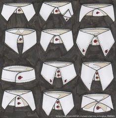 an image of some white cloths with red dots on them and one has a collar