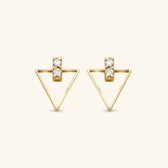 These Diamond Triangle Studs are bound to elevate your earring game to the next level. Mixing geometric shapes with diamonds, sporting these cool studs will be sure to get you the compliments you deserve. - 14k solid yellow gold - Carat weight: 0.16 ctw total - High quality diamonds, G-H color, SI1-SI2 clarity Modern Gold Earrings With Brilliant Cut, Modern Yellow Gold Earrings With Brilliant Cut, Modern 14k Gold Diamond-cut Diamond Earrings, Modern 14k Gold Earrings With Diamond Accents, Modern 14k Gold Diamond Cut Earrings, Modern 14k Gold Diamond Earrings With Single Cut Diamonds, Modern 14k Gold Diamond Earrings With Single Cut, Modern 14k Gold Diamond Earrings, Modern 14k Gold Diamond Earrings For Anniversary