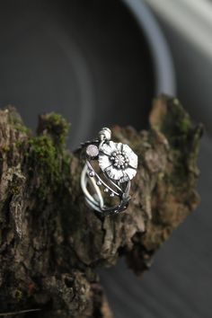 ITEM DESCRIPTION: The size of ring 7 (US and Canada) O (UK and AU) I can make it any size you want - just mark your size in the order Weight - 2,5 g. I made this botanical ring of sterling silver and garnet. I placed a highly detailed poppy flower in the center. And the leaves are located on the sides of it. I can make it with different gemstones - write to me and will discuss your custom order. I usually respond to letters very quickly. This Elven ring will be a great addition to your jewelry c Bohemian Flower Ring For Promise, Bohemian Flower Rings For Anniversary, Metal Flower Ring For Promise, Flower Shaped Metal Ring For Promise, Flower Shaped Promise Ring With Flower Charm, Silver Flower Ring For Promise, Nature-inspired Flower Promise Ring, Silver Promise Flower Ring, Nature-inspired Flower Ring With Birth Flower Detail