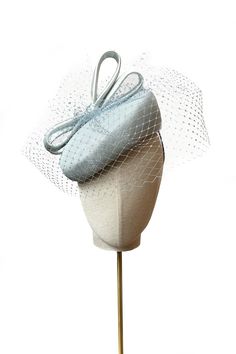 A stunning millinery collaboration between Suzannah London and John Boyd Hats, the Sharp Beret is perfectly tailored, trimmed with a sculptural silk covered bow, and featuring tonal netting. A fine wire band secures the hat to the head, ensuring it stays in place all day. A true vintage heirloom we have been delighted to showcase and work with thanks to the John Boyd team. Handcrafted in London, this is an elevated and special hair accessory for weddings and special occasions. Please note that t Cocktail Hats For Women, Beret With Bow, Suzannah London, John Boyd, Hat Inspiration, Royal Clothes, Eucalyptus Green, Mother Of The Bride Dresses Long, Gown Suit