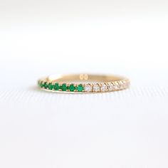 Natural Green Emerald and Diamond Ring on Solid 14K Yellow Gold, Half Diamond, and Emerald Wedding Band, 1.5mm Micro Pave Half Eternity Band Welcome to Blush Karats. This listing is for a stunning half eternity band set in a pristine U-prong micro-pave style. The band features a combination of vivid bright green emeralds and colorless V diamonds. All gemstones are natural and feature a stunning round fully faceted diamond cut. The band is pictured on solid 14K yellow gold, but you have the optio Wedding Jewelry With Single Cut May Birthstone Diamonds, May Birthstone Jewelry With Single Cut Diamonds For Wedding, Emerald Half Eternity Wedding Band, Emerald And Diamond Wedding Band, Emerald Green Wedding Band, Green Wedding Band, Emerald And Diamond Band, Emerald Eternity Ring, Eternity Band Set