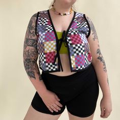 Available in Small & Medium see measurement comparison in last photos model typically wears a size L measurements are 43in bust 38in waist - wearing size M in photo Unleash your inner fun with our Rainbow Checker Vest with Tie. Made from soft cotton, this top features a playful checker pattern and front tie. Perfect for summer or layering for a quirky look. Fitted Multicolor Casual Vest, Multicolor Fitted Casual Vest, Casual Fitted Multicolor Vest, Fitted Multicolor Beach Vest, Checker Vest, Rhinestone Cowgirl, Checker Pattern, Louisville Ky, Find You