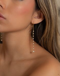 Simplicity! These the fresh water pearl earrings make a fashionable statement. The long and sexy look is striking. Dangle Pearl Earrings For Party, Pearl Chandelier Earrings For Evening, Drop Pearl Earrings For Evening, Elegant Pearl Linear Earrings For Party, Elegant Drop Pearl Earrings With Dangling Beads, Pearl Drop Chandelier Earrings, Dangle Pearl Earrings With Dangling Beads For Party, Pearl Charm Dangle Chandelier Earrings For Party, Elegant Chandelier Earrings With Dangling Beads For Evening