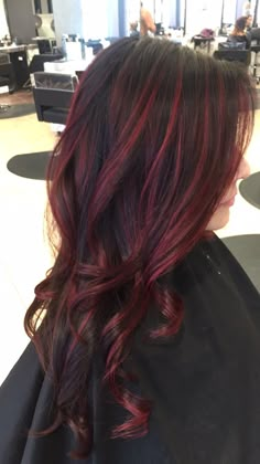 Red Underdye Hair With Highlights, Red Highlights On Black Wavy Hair, Dark Red With Bright Red Highlights, Dark Red Stripes Hair, Dark Hair Red Streaks, Red And Brown Bayalage Hair, Dark Brown Hair And Red Highlights, Dark Red Hair Color Highlights, Black Brown And Red Hair