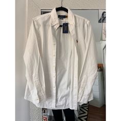 Ralph Lauren Polo White Button Down Shirt Size Small Never Worn Great Quality White Business Casual Shirt With Collar, Classic Shirt With Casual Collar, White Business Casual Blouse, White Casual Blouse For Business Casual, Classic White Tops With Button Closure, Classic White Shirt With Buttons, White Casual Dress Shirt With Placket, White Dress Shirt With Buttons For Spring, Casual Office Shirt With Snap Buttons