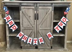 an old wooden cabinet decorated with red, white and blue bunting