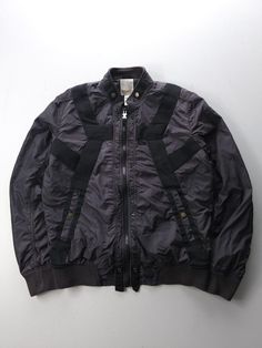 Listing: Vintage Diesel Strapped Nylon Parachute Bomber Jacket 2000s Black Medium Size on Tag: M Flaws: No major flaws Measurements: Please see the photos in the listing. If you require additional measurements or information about this item, feel free to send a message. Fitted Nylon Windbreaker For Winter, Utility Nylon Track Jacket For Streetwear, Nylon Windbreaker With Zip Fly For Streetwear, Nylon Techwear Outerwear With Zip Fly, Urban Nylon Track Jacket For Fall, Fall Nylon Track Jacket In Techwear Style, Fitted Nylon Windbreaker With Pockets, Urban Nylon Utility Jacket For Streetwear, Black Fitted Nylon Track Jacket