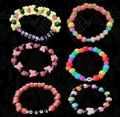 *Bracelet Measurements Morgue Girl - 17.5 Rainbow With Heart Bead - 17 cm Let's Party- 17 cm Butterfly - 18.5 cm Domo - 17.5 cm Black + Rainbow With Butterfly Bead- 17 cm *All bracelets sold by me are one size fits most, if you need a certain size please message me! I'll be happy to help you, free of charge. These bracelets are handmade!! If you have any questions or need a size change please message me, I'd love to help! Trendy Beaded Bracelets With Heart Beads For Party, Trendy Beaded Bracelet With Heart Beads For Party, Cute Bracelets With Heart Beads For Party, Cute Heart Beads Bracelets For Party, Cute Heart Beads Bracelet For Party, Scene Kid Bracelets, Scene Kid Outfits, Kid Bracelets, Scene Bracelets