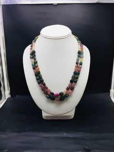 100% Natural multi Tourmaline hand-carved nugget shape beaded necklace with adjustable silk cord closure. Details: - Gemstone - Multi Tourmaline Shape - Oval nugget Strand - 2 Calibration of beads - 6x8 millimeters till 10x14 millimeters Gross weight - 395.60 carat Net weight - 373.10 carat Length - 18 Inches ( Inner ) and 19 Inches ( Outer ) SKU - HJSPSAR0089 100% NATURAL MULTI-COLORS OF TOURMALINE READY TO WEAR NECKLACE ADJUSTABLE SILK CORD CLOSURE VERY NICE LOOKING NECKLACE UNIQUE NECKLACE AT Spiritual Multicolor Faceted Necklace, Multicolor Single Strand Gemstones As A Gift, Multicolor Multi-stone Tourmaline Necklaces, Multicolor Faceted Gemstones For Healing, Multicolor Multi-stone Oval Necklaces, Multicolor Multi-stone Tourmaline Necklace, Multicolor Tourmaline Multi-stone Necklace, Oval Multicolor Multi-stone Necklaces, Multicolor Multi-stone Oval Necklace