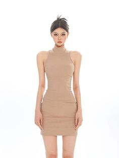 Embrace effortless sophistication with our Sleeveless Turtleneck Ribbed Bodycon Dress, a versatile must-have for any wardrobe.
Crafted with a figure-hugging silhouette, this dress features a high turtleneck and a rib[censored] texture that offers both comfort and style. The subtle stretch of the fabric ensures a flattering fit that moves with you, making it an ideal piece for both day-to-night transitions.
Pair it with a blazer for a professional look or dress it down with sneakers for a casual Fitted Ribbed Mini Dress With Halter Neck, Fitted Ribbed Halter Neck Mini Dress, Ribbed Fitted Sleeveless Mini Dress, Fitted Ribbed Sleeveless Knee-length Dress, Chic Sleeveless Ribbed Stretch Dress, Ribbed Bodycon Sleeveless Mini Dress, Ribbed Fitted Sleeveless Dress, Knee-length, Fitted Sleeveless Halter Neck Dress, Elegant Stretch Ribbed Sleeveless Dress