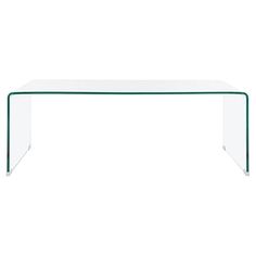 a clear glass table with two legs and a green edge on the top, against a white background