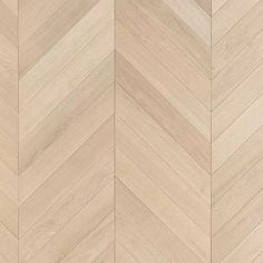 an image of wood flooring that looks like chevroned herringbones pattern