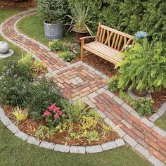 a wooden bench sitting in the middle of a garden