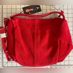 Nwt New With Tags Red Suede Sling Backpack / Handbag/ Purse By Vanessa Williams, Gold Hardware, Includes Black Storage Pouch. About 12” Wide And 10” Tall. Has A Cel Phone Pocket On The Outside, As Pictured. Inside The Purse It Has 2 Cell Phone Size Pockets As Well As A Zipper Pocket. Two Adjustable Straps For Wearing Like A Backpack. Excellent Brand New Condition, Never Used. Genuine Suede. Christmas, Valentine’s Day, Sexy, Red Leather. Red Hobo Shoulder Bag For Shopping, Red Hobo Bag For Shopping, Red Rectangular Hobo Bag For Travel, Red Crossbody Shoulder Bag For Travel, Red Bucket Shoulder Bag For Travel, Red Travel Shoulder Bag With Adjustable Strap, Red Shoulder Bag With Adjustable Strap For Travel, Red Shoulder Bag For Travel, Casual Red Satchel For School