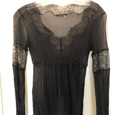 Like New Originally Priced $248.00 Brand: Elie Tahari Size: Xxs Color: Black Gently Worn But Still Looks Brand New Sheer Black With Lace Detail Elegant V-neck Tops With Sheer Sleeves, Elegant V-neck Top With Sheer Sleeves, Sheer Fitted V-neck Blouse, Fitted Black Mesh Top With Lace Trim, Fitted V-neck Sheer Mesh Top, Evening V-neck Top With Sheer Sleeves, Black V-neck Tops With Sheer Sleeves, Fall Season V-neck Mesh Top, Elegant Long Sleeve Mesh Top For Date Night