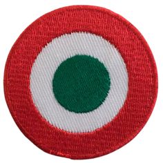 a red and white circle with green center