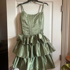 Stacees Green Dress Never Worn With The Tags Still On. Was Planning To Wear For Homecoming But It Was To Big. The Size Is 26 And The Measurements Are On The Tag In The Photo Above. Was Originally Bought For 152 Dollars But Will Sell For 90 Dollars. Let Me Know If You Have Any Questions Green Fitted Tiered Mini Dress, Fitted Green Tiered Mini Dress, Fitted Lined Tiered Dresses, Formal Green Mini Dress With Ruffles, Vintage Satin Summer Dresses, Formal Tiered Dress With Fitted Bodice, Green Tiered Mini Dress For Party, Spring Formal Tiered Mini Dress, Fitted Tiered Cocktail Dress