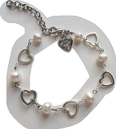 White Heart-shaped Metal Charm Bracelet, White Pearl Bracelet With Adjustable Chain, Elegant White Nickel-free Pearl Bracelet, White Pearl Heart Bracelet With Pearl Charm, White Pearl Bracelets With Adjustable Chain, Adjustable Heart-shaped Pearl Bracelet, Adjustable Nickel-free Metal Pearl Bracelet, Elegant White Pearl Heart Bracelet, White Adjustable Pearl Bracelet