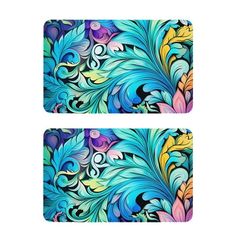 two placemats with colorful designs on the front and back of each one, both in