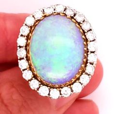 Opal And Diamond Ring, Jewelry Accessories Ideas, Halo Setting, Accessories Ideas, Round Brilliant Cut Diamond, Yellow Gold Rings, Round Brilliant, Halo, Diamond Ring