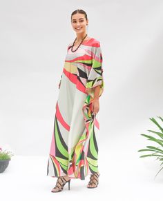 A full length kaftan plus size featured with minimalist abstract  will bring the elegant vibe of Spring and perfect for holiday occasions or any occasion you attend. The fabric is blended silk with more than 80% silk so the care is more easier with washing and iron, in addition less wrinkles. It's totally smoothly flowy, soft and gentle touch. FEATURES - Curvy lines - Vibrant colors - Personal Custom Made - Full Length Kaftan Half-Sleeves - Designer Silk Kaftan - Plus Size and Custom Length - Resort Wear, Beach Wear, Lounge Wear, Pool Cover Up Kaftan - Boat Neck -------------------------------- DETAIL  * The size can be adjusted to fit up to 5 XL. Bust/ Waist/ Hip up to 50 inches ( 100 inches full circumference)  * Length of the kaftan could be max. 55 inches. All length will be custom mad Chic Flowy Long Kaftan Dress, Green Abstract Print Maxi Dress For Beach, Green Abstract Print Maxi Dress For Vacation, Green Maxi Dress With Abstract Print For Beach, Chic Multicolor Kaftan With Kimono Sleeves, Beach Season Printed Maxi Dress With Kimono Sleeves, Elegant Printed Beach Kaftan, Flowy Abstract Print Maxi Dress, Flowy Maxi Dress With Abstract Print