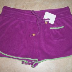 Beach/ Sleep Shorts By Kensie (Nordstrom). Purple (Grape) Stretch Terry... Lime Green Lace Trim Accents On Leg Openings And Tiny Patch Pocket On Front... Elastic Waist With "Rope" Drawstring... Perfect For A Day At The Beach, Or Use As Sleepwear... Size: Medium Waistband: 30" Not Stretched Rise: 10-1/2" Hip: 42" Inseam: 2" 60% Cotton/ 40% Polyester ... Washable... New... Excellent Condition... Beach Season Loungewear Pajama Shorts With Pockets, Beach Season Pajama Shorts With Pockets For Loungewear, Fitted Shorts For Summer Relaxation, Fitted Casual Shorts For Relaxation, Casual Fitted Shorts For Relaxation, Purple Stretch Pajama Shorts, Summer Stretch Purple Pajama Shorts, Purple Stretch Pajama Shorts For Summer, Fitted Purple Shorts For Loungewear