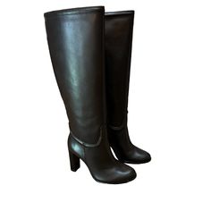 Alexandre Birman "Lauren" Saddlery Knee Boot Is Fully Crafted In Our Slickest Capreto Leather With A Soft Napa Kiss Detail That Allows You Different Style Options. 3.50 In / 90 Mm Block Heel Boot Shaft, Approx. 15.3"H Round Toe Side Zip Eases Dress Leather Outsole Lining: Leather Made In Brazil Size Eu 36/Us 6 Winter Leather Heels For Office, Designer Leather Knee-high Boots, Winter Business Heels In Leather, Winter Business Leather Heels, Classic Heeled Boots With Round Toe And Heel Tab, Leather Knee-high Heeled Boots With Branded Heel Counter, Classic Round Toe Heeled Boots With Heel Tab, Classic Heeled Boots With Heel Tab And Round Toe, Leather Knee-high Heeled Boots With Branded Heel