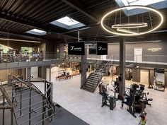 an overhead view of a gym with people working out