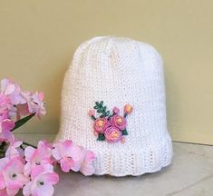 Baby Girl Flower Hat Knit and Embroidered, Newborn Pink Roses Hat 0-12 mos. Handmade White Crochet Hat For Gift, White Embroidered Beanie Hat, Cute White Crochet Hat For Gift, Cute White Crochet Hat For Gifts, Cute White Hand Knitted Beanie, Cute White Handmade Crochet Hat, Cute White Crochet Hat As Gift, White Embroidered Hat For Gift, Cute White Knitted Bonnet