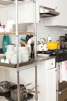 the kitchen is clean and ready to be used as a storage area for cooking utensils