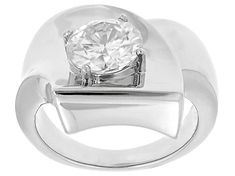 a white gold ring with a diamond in the center