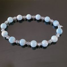 Rare Aquamarine Handcrafted Beaded Bracelet - Gemstone Beaded Bracelet Material: Aquamarine 8 Mm Beads, Swarovski Crystal 4 Mm Beads Dimension: 6.5 In Length Rare Handmade New Without Tag Charm Bracelets Diy, Aquamarine Bracelet Beads, Aquamarine Bracelet, Brace Yourself, Bracelets Diy, Gemstone Beaded Bracelets, Handmade Wire Jewelry, Bracelet Gemstone, Beading Jewelry