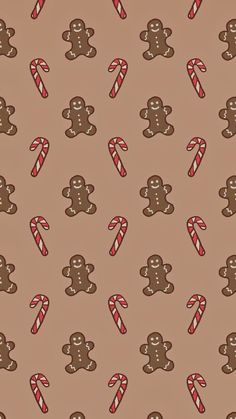 a brown background with gingerbreads and candy canes