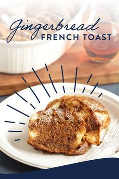 a white plate topped with french toast covered in powdered sugar