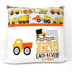 Encourage the young readers in your life with a special reading pillow. The cute yellow and orange construction fabric is a great choice for a growing boy who loves to read. The front pocket is perfect for holding a book, e-reader, etc. Features Of Our Construction Book Pocket Pillow The cover measures 15" x 15" and uses a 16" x 16" insert that is available as an option. Personalized is available as an option. Cover is 100% cotton and constructed with all seams fully finished. The concealed zipp Pillow With Pocket, Small Stuffed Toys, Commercial Embroidery Machine, Airplane Theme, Pillow Embroidery, Book Pillow, Pocket Pillow, Reading Pillow, Birthday Gifts For Boys