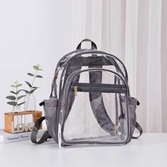 Clear Stadium Backpack With Grey Trim * Solid Trim Medium Clear Backpack * Light-Weight, Simple Design For Everyday Essentials * Perfect Daily Backpack To Take Anywhere * Zipper Closure With Multiple Pockets And Key Hooks * **Size: Approx. 11" L X 6.2" W X 15.8" H ** Last 5 Pictures Shows Other Views And Details In Black Trim Version Daily Backpack, Clear Backpack, Fashion City, City Woman, Light Backpack, Grey Trim, Key Hooks, City Bag, Clear Bags