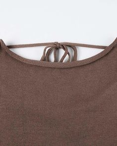 Details: Long-sleeve sweater with halter designTop Length: Normal Sleeve Length: Long Sleeves Materials: 100% Acrylic Solid Ribbed Halter Neck Top, Fitted Halter Neck Top For Fall, Brown Summer Crew Neck Knit Top, Fitted Halter Top For Fall, Summer Turtleneck Knit Top, Stretch Turtleneck Knit Top For Summer, Casual Spring Halter Neck Knit Top, Summer Stretch Turtleneck Knit Top, Brown Knit Solid Color Top