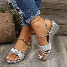 Category:Sandals; Upper Materials:Faux Leather; Season:Summer; Heel Type:Wedge Heel; Gender:Women's; Style:Casual,Elegant; Heel Height(inch):3-4; Outsole Materials:Rubber; Occasion:Beach,Outdoor; Closure Type:Loafer; Listing Date:05/10/2023; Production mode:External procurement; 2024 Trends:Wedge Sandals,Plus Size; Foot Length:; Foot Width:; SizeChart1_ID:2:183885; Size chart date source:Provided by Supplier. Silver Flat Heel Wedge Sandals For Spring, Synthetic Toe Post Wedge Sandals For Summer, Casual Silver Heels For Beach, Casual Silver Wedge Sandals For Summer, Silver Leather Wedge Sandals For Beach, Silver Wedge Sandals For Summer, Silver Leather Wedge Sandals For Summer, Silver Wedge Sandals For Beach In Summer, Summer Silver Platform Wedge Sandals