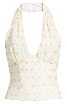 Charming ombré floral embroidery covers this stretch-kissed top designed in a halter silhouette for trendsetting appeal. 8 1/2" length (size Medium) Back button-and-loop closure Halter neck Sleeveless, with cutaway shoulders Lined 95% polyester, 5% elastane Dry clean Imported Chic Fitted Floral Halter Top, Fitted V-neck Halter Top For Spring, Fitted Floral Print Halter Neck Top, Fitted Floral Print Halter Top, Spring Floral Print V-neck Halter Top, Spring Lace Halter Top, Fitted Floral Embroidered Cropped Tops, Fitted Floral Embroidery Tops For Spring, Fitted Cropped Top With Floral Embroidery