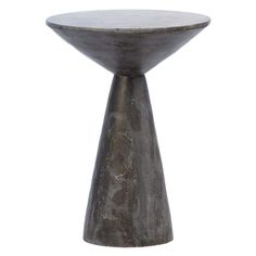 a small table that is made out of concrete and has a round base on the top