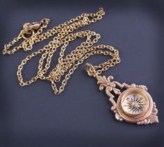 "Neo victorian necklace with working compass! High quality brass compass is soldered in a Victorian pendulum style setting. Victorian steampunk minimalist necklace. Dainty lightweight compass necklace but sturdy enough to wear everyday. This working compass is solid brass and has a glass top. The pendulum necklace is accented with a Swarovski crystal. You may personalize it with the color of your birthstone. Birthstone necklace for mom, grandma, graduation, women! The ORIGINAL compass pendant de Vintage Compass Pendant Jewelry, Bronze Compass Design Jewelry Gift, Bronze Compass Design Jewelry For Gifts, Bronze Compass Design Jewelry As Gift, Vintage Gold Necklace With Compass Design, Gold Vintage Necklace With Compass Design, Brass Compass Design Round Pendant Necklace, Vintage Compass Design Jewelry Gift, Brass Jewelry With Compass Design Round Pendant