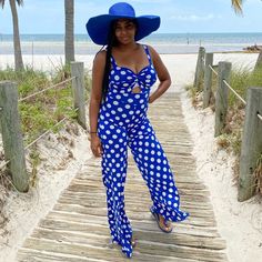 Stretch Jumpsuit, Sleeveless, Back Zipper Closure, Wide Leg, Polka Dot Print. Model Is Wearing A Small. Polka Dot Sleeveless Summer Swimwear, Sleeveless Polka Dot Summer Swimwear, Sleeveless Jumpsuits And Rompers For Poolside And Beach Season, Chic Sleeveless Jumpsuit For Poolside, Spring Sleeveless Swimwear With Polka Dot Pattern, Polka Dot Sleeveless Swimwear For Spring, Sleeveless Polka Dot Jumpsuits And Rompers, Purple Jumpsuits And Rompers For Summer Beach, Purple Jumpsuits And Rompers For Beach In Summer