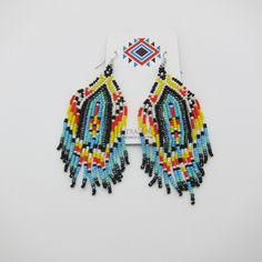 Beautiful Native American Style handmade earrings. Stainless steel ear wires and all made by ethnic artisans. Beautiful new colors and styles for matching regalia or wearing alone. Great price and free shipping! Native American Style, Handmade Earrings Beaded, Design Seeds, Native American Fashion, Boho Designs, Seed Bead Earrings, Color Free, Bead Earrings, Modern Boho