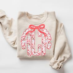 Personalized Faux Embroidery Monogrammed Christmas Sweatshirt  ⭐⭐ Product Description ⭐⭐ .: Unisex crewneck sweatshirt .: Material: 50% Cotton 50% Poly Blend .: Soft, Super Comfy and Durable .: Eco-friendly 📏 SIZING AND COLORS 📚 ✺ Sweatshirts are Unisex, classic fit ✺ Please refer to the size and color charts in the listing photos for details Note: Not every color is available - check the drop-down for options ✺ Easy measuring tip: Take your favorite shirt, lay it on a flat surface, and measure the width    (armpit to armpit) and length (top to bottom) ✺ Product color may vary slightly due to photographic lighting sources or your monitor settings 🧺 WASHING INSTRUCTIONS 🧺  .: Machine wash: cold (max 30C or 90F) .: Tumble dry: low heat .: Do not iron directly on top of the design (Iron i Monogram Sweatshirt, Christmas Monogram, Embroidery Monogram, Holiday Items, Christmas Sweatshirts, Favorite Shirts, Crewneck Sweatshirt, Sweat Shirt, Favorite Outfit