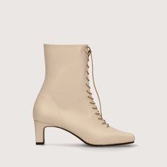 These 5.5cm heel short boots have a trendy lace-up and wide square toe. Elegant Fitted Lace-up Boots For Spring, Elegant Lace-up Boots For Spring, Fitted Almond Toe Boots With Laces, Spring Lace-up Heeled Boots With Reinforced Heel, Elegant Medium Width Lace-up Boots For Spring, Elegant Fitted Lace-up Mid-calf Boots, Elegant Lace-up Leather Mid-calf Boots, Elegant Lace-up Mid-calf Boots For Fall, Chic Beige Lace-up Boots For Fall